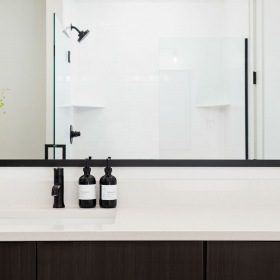 Bathroom Large well lit bathroom with white accents